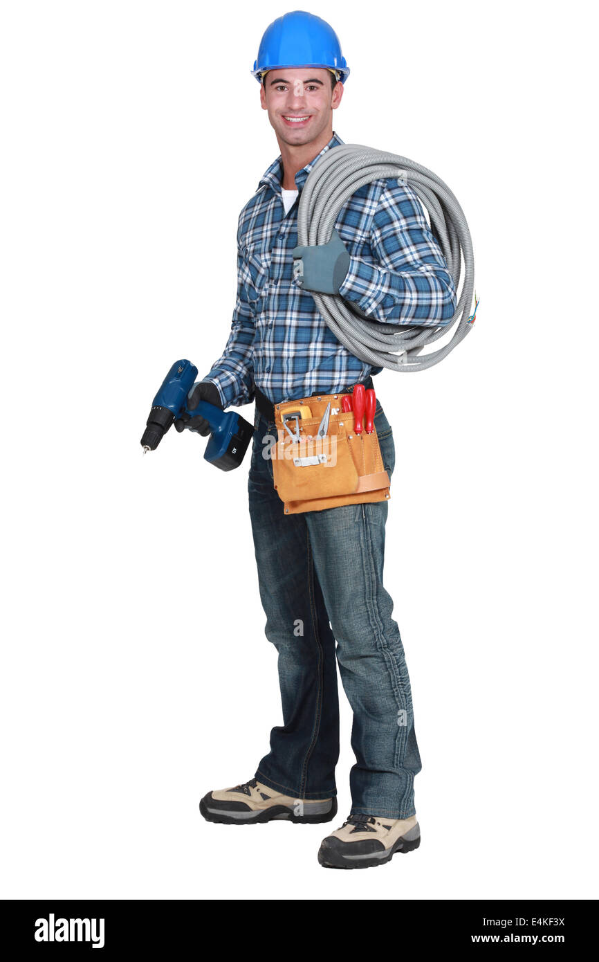 An electrician on his way to work. Stock Photo
