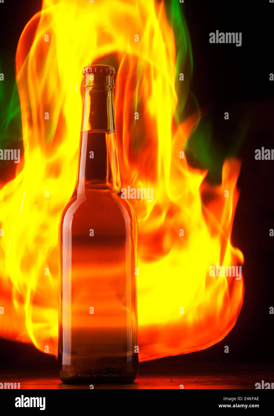 Beer bottle with color fire Stock Photo Alamy