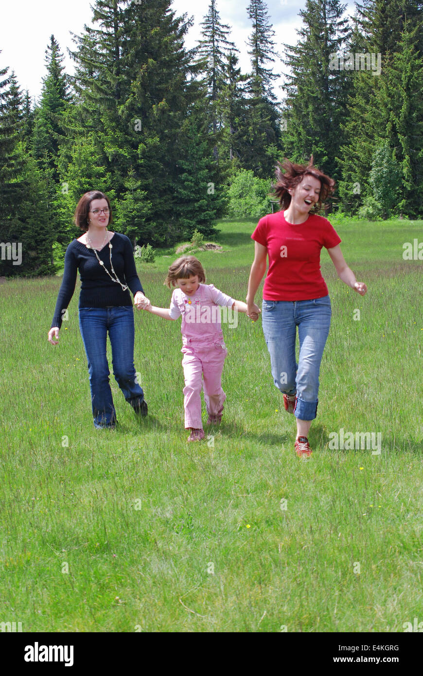 happy girls running in nature Stock Photo - Alamy