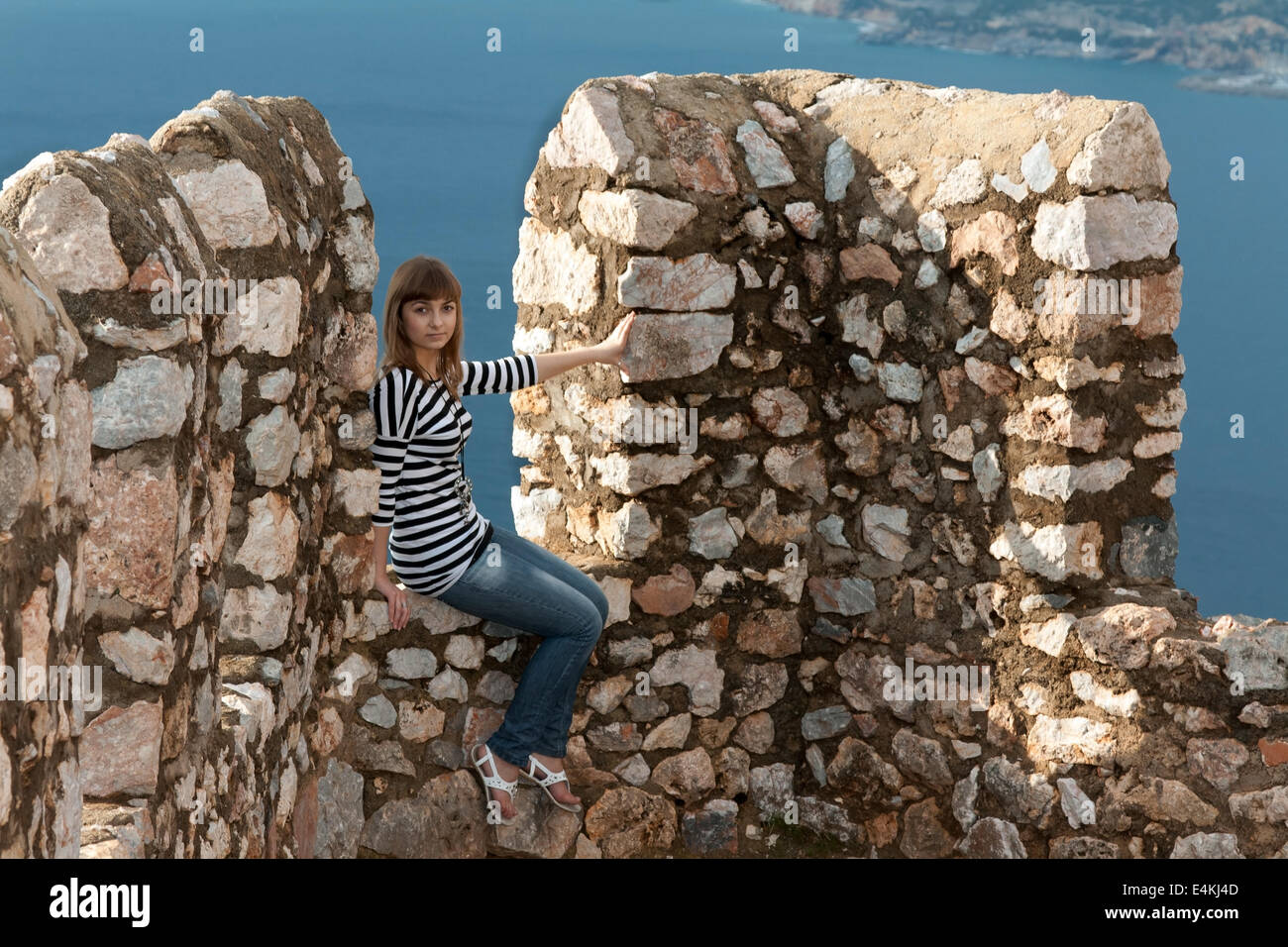 girl on the wall Stock Photo - Alamy