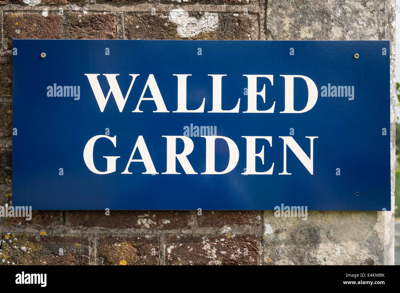 Sign outside a walled garden open to the public Stock Photo
