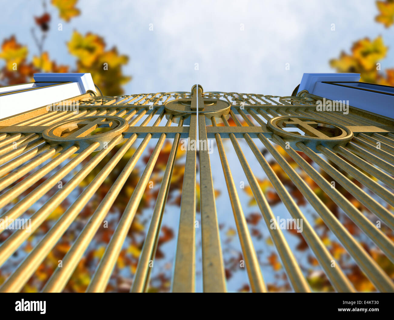 A concept image of the golden gates to heaven shut on an autumn leave and blue sky background Stock Photo