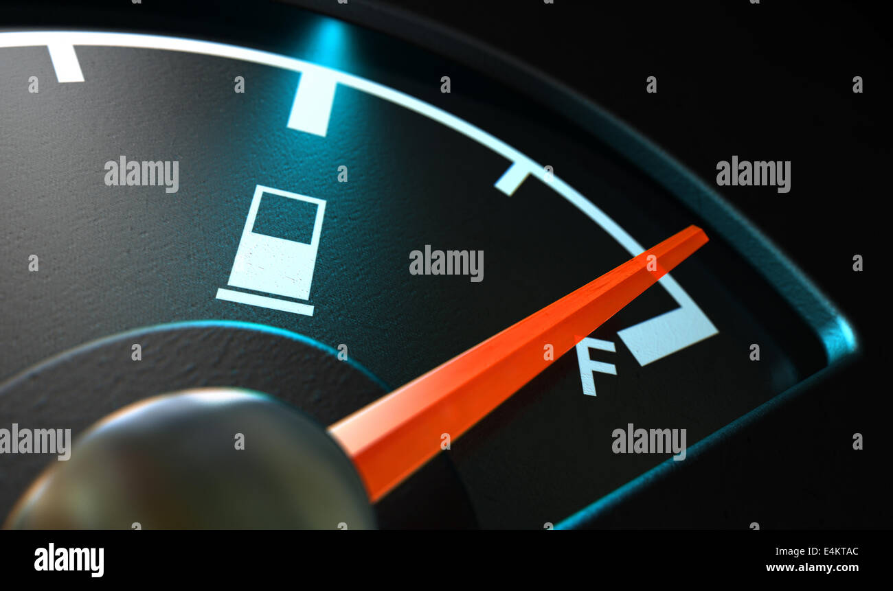 A closeup of a backlit illuminated gas gage with the needle indicating a near full tank on an isolated dark background Stock Photo