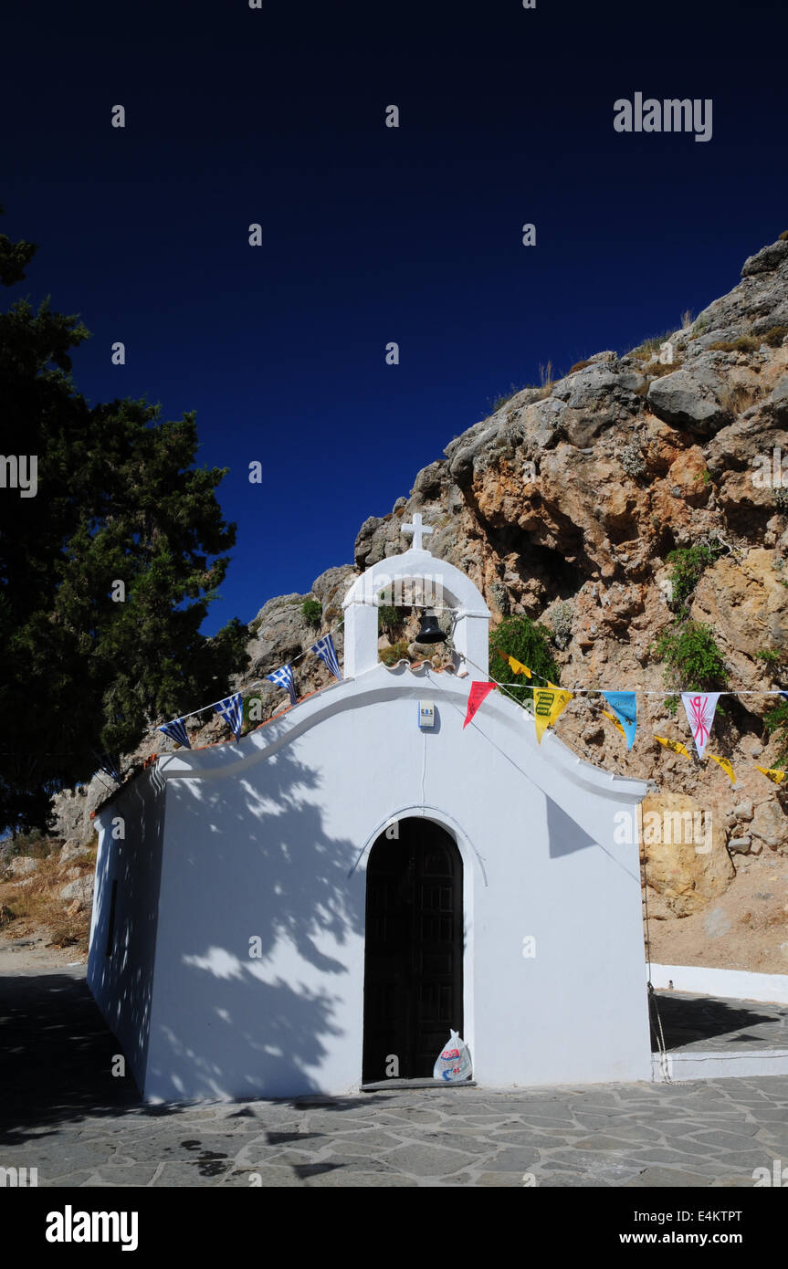 St Paul's Chapel, pretty white Greek chapel, St Paul's Bay, Lindos, Rhodes, Greece Stock Photo