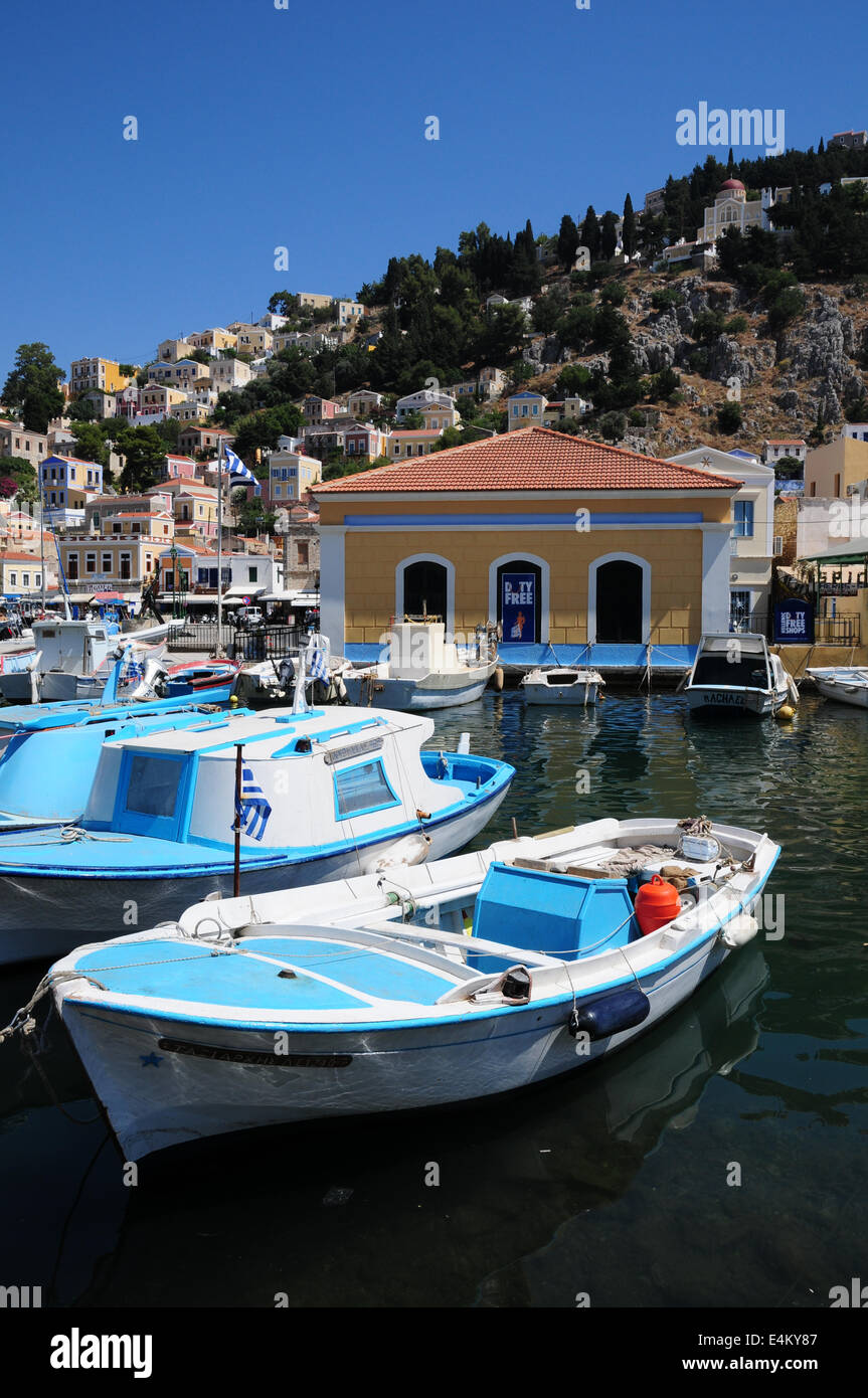 Boats in harbour of Symi on Greek island of Symi Stock Photo Alamy