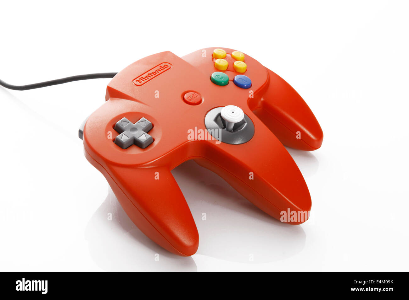 a red joystick of an old vintage nintendo 64 Stock Photo