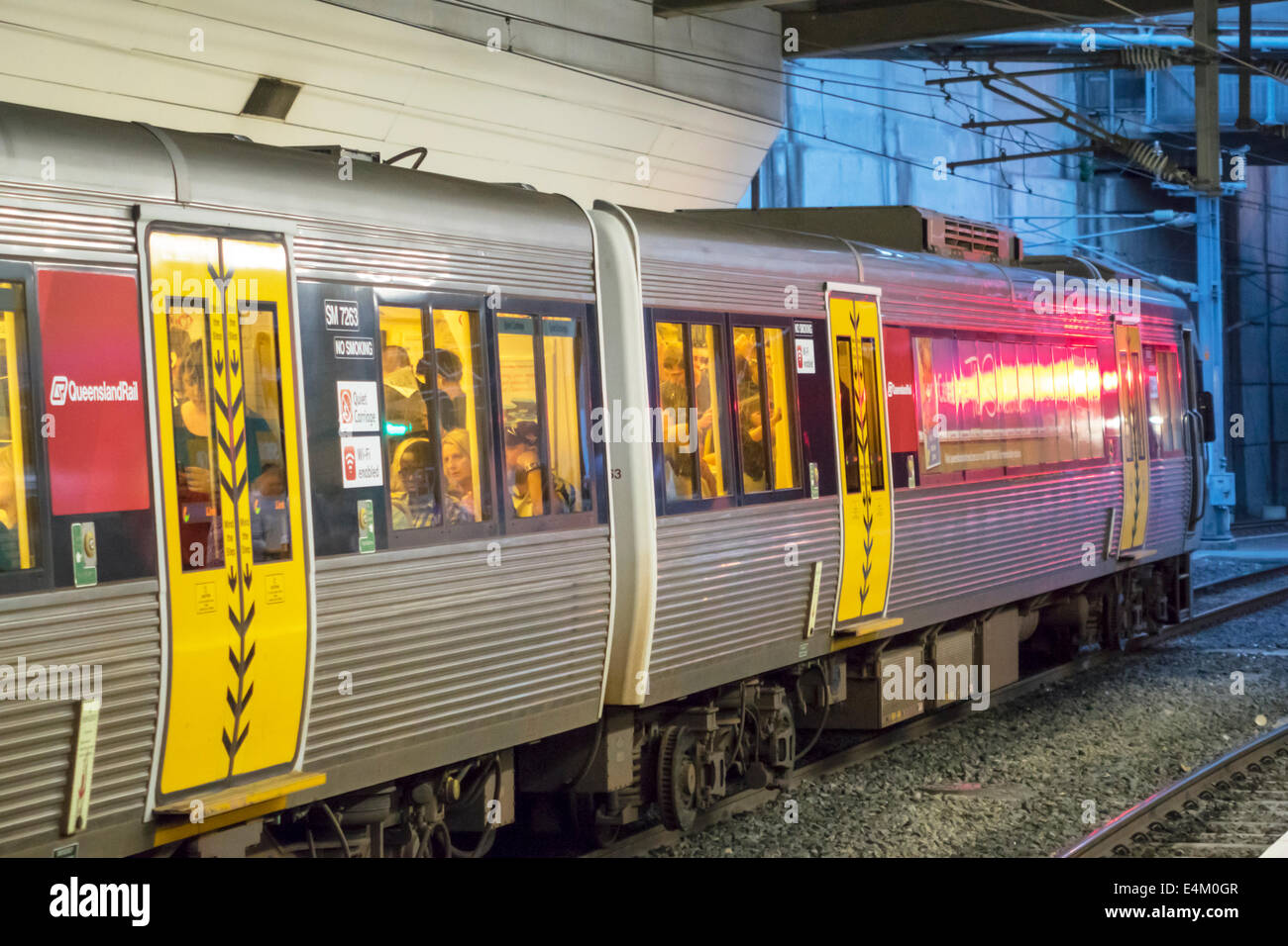 Brisbane Australia,Central Station,public transportation railway station,rail,train,riders,commuters,passenger passengers rider riders,passenger cabin Stock Photo