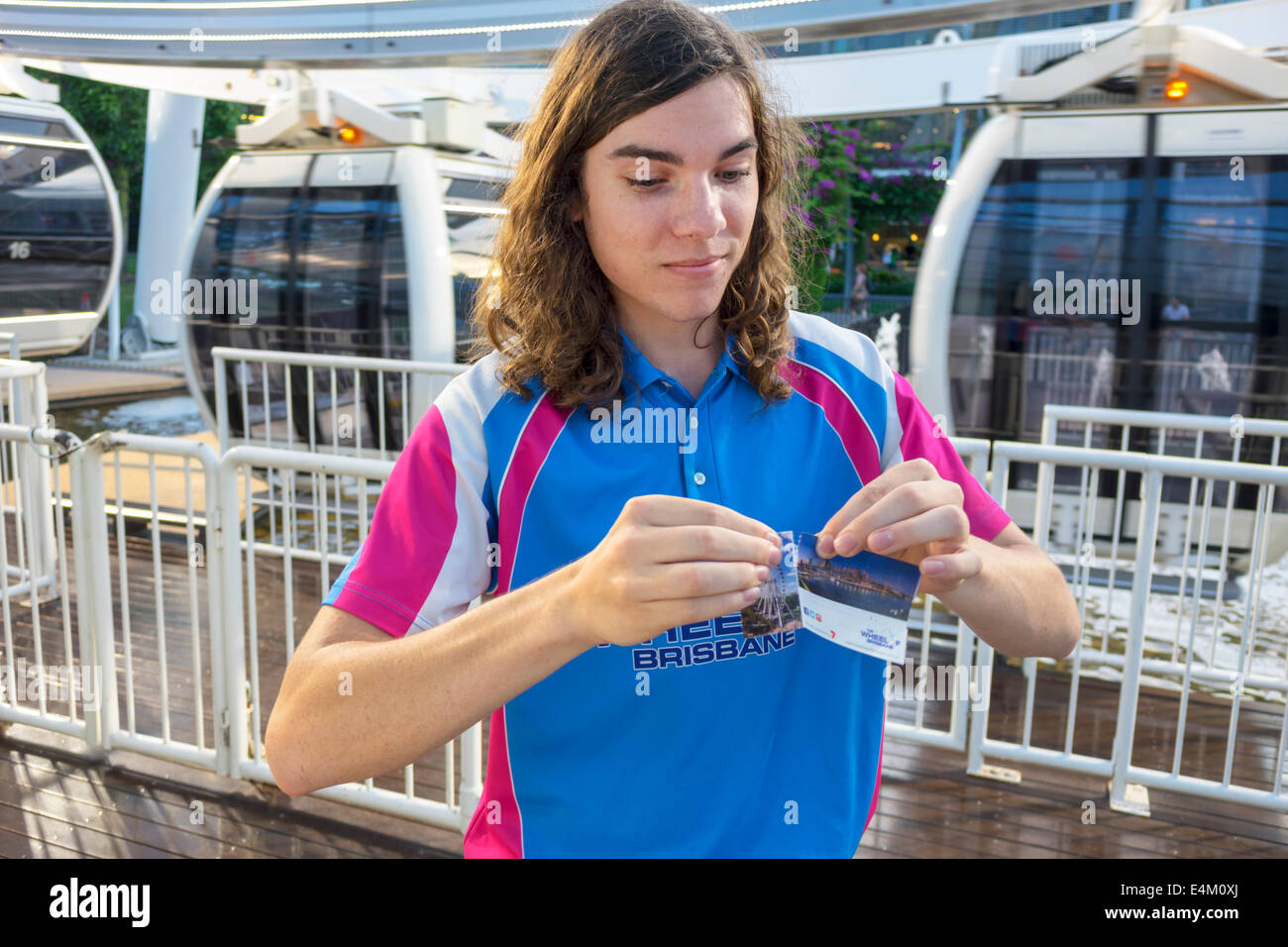 Brisbane Australia,Southbank,The Wheel,Ferris wheel,teen teens teenager teenagers boy boys,male kid kids child children youngster youngsters youths jo Stock Photo