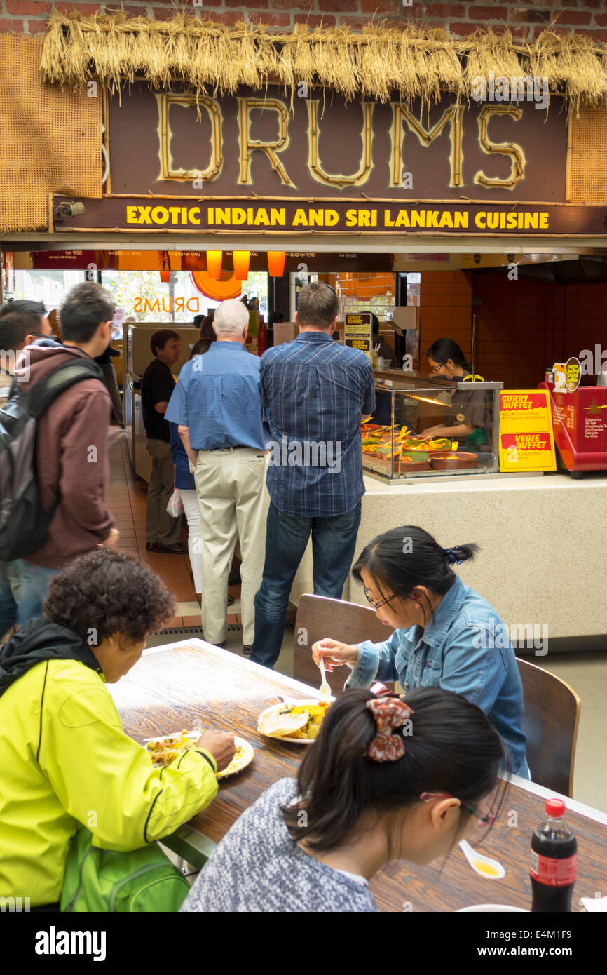 Melbourne Australia,Queen Victoria Market,Drums,restaurant restaurants food dining cafe cafes,Indian,Sri Lankan,Asian woman female women,table,AU14031 Stock Photo