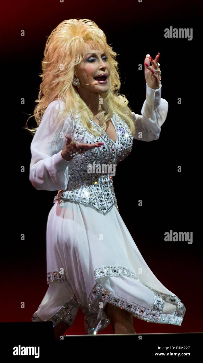 Singer Dolly Parton on stage during her Blue Smoke tour at the Motorpoint Arena on June 24, 2014 in Cardiff, Wales Stock Photo