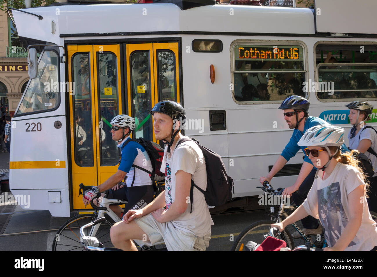 Melbourne Australia,Yarra Trams,tram,trolley,tramway,man men male,woman female women,biker bikers bicycle bicycles,bicycling biking riding rider exerc Stock Photo