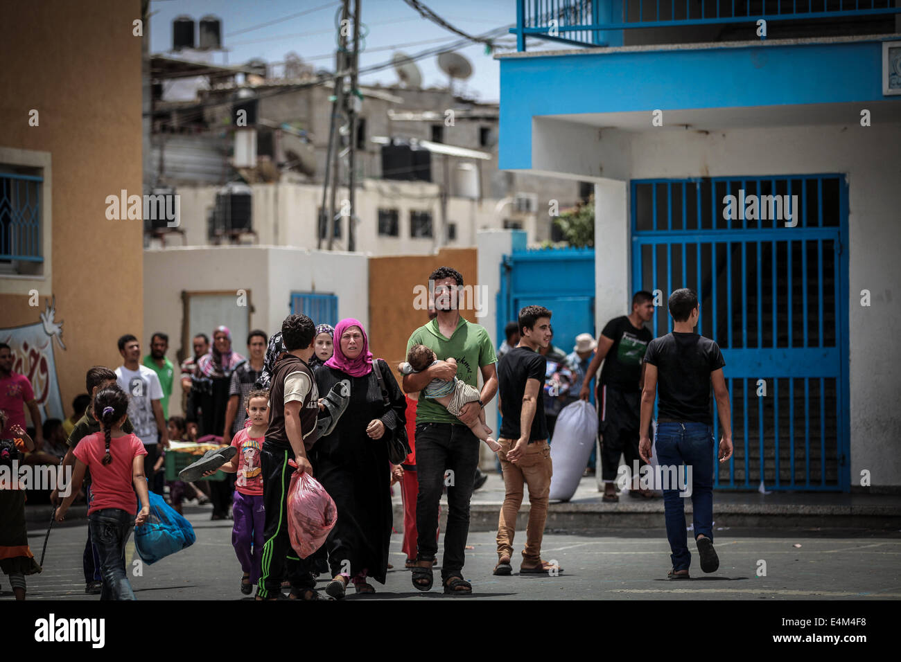 Gaza, Palestinian Territories. 13th July, 2014. A Palestinian Family In ...