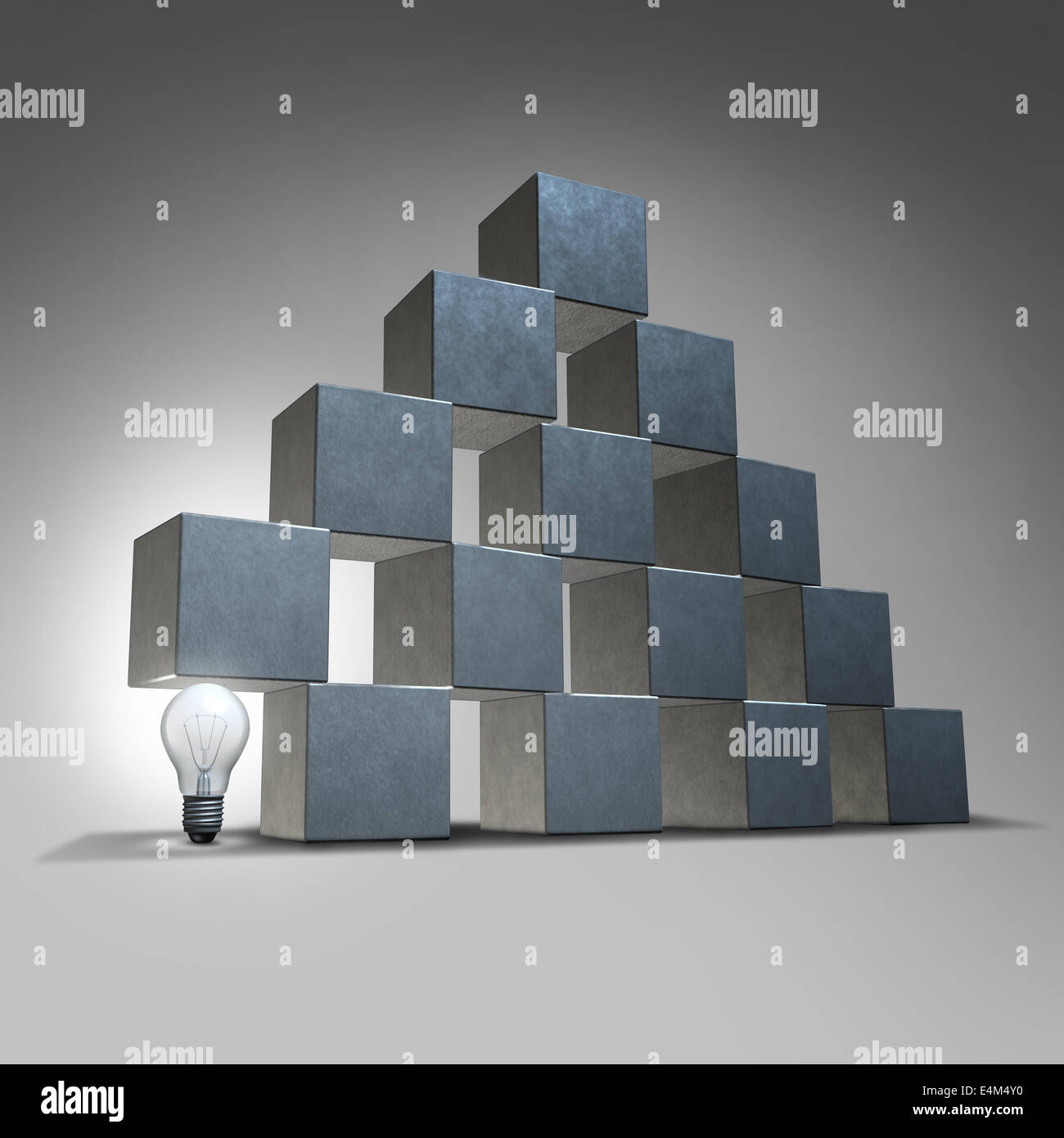 Creative support and business marketing partnership concept as a group of three dimensional cubes being supported by an illumina Stock Photo