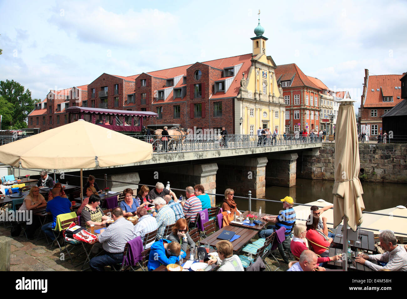 Cafe and restaurant at Stintmarkt in the old harbor of Lueneburg,  Lüneburg, at river Ilmenau,  Lower Saxony, Germany, Europe Stock Photo