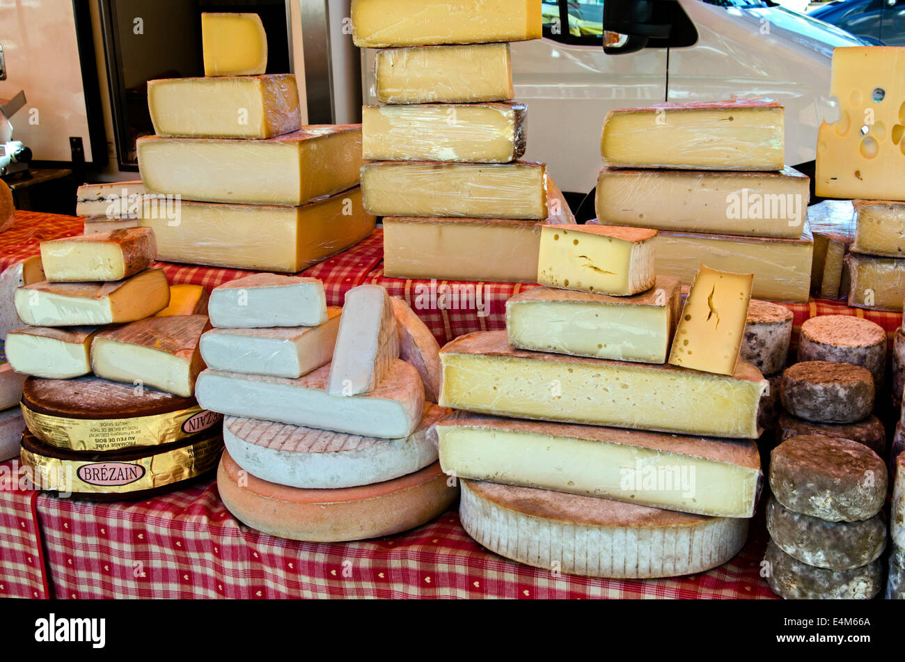 A selection of cheeses on a market stall at the Saturday market in
