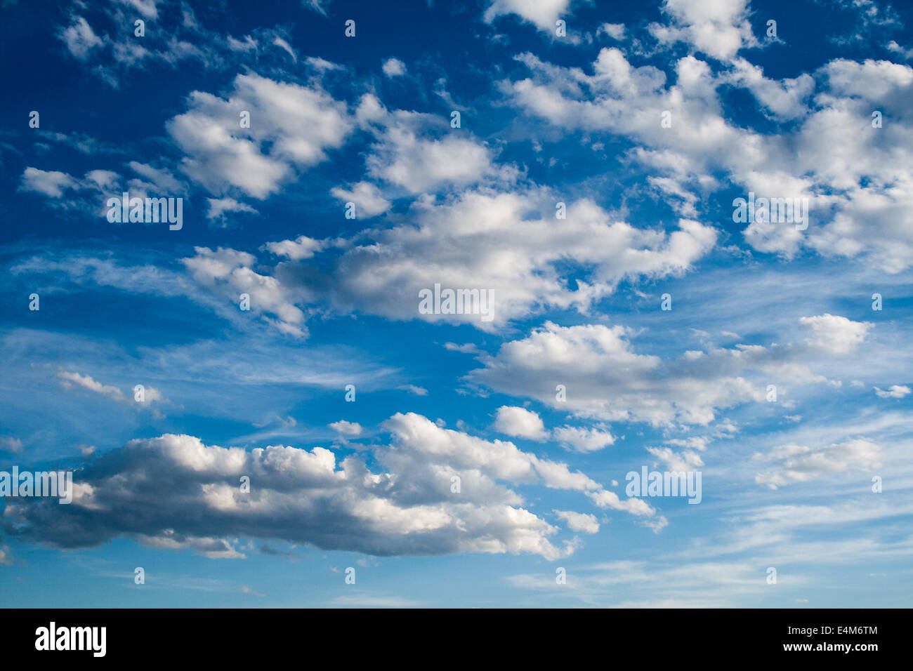 Blue Sky with white fluffy Clouds Stock Photo - Alamy