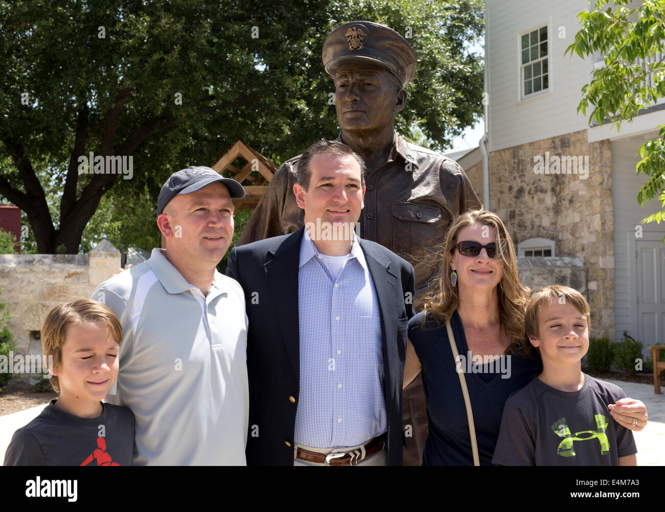 Republican U.S. Senator Ted Cruz poses with constituents in front of the Admiral Nimitz statue in Fredericksburg, Texas Stock Photo