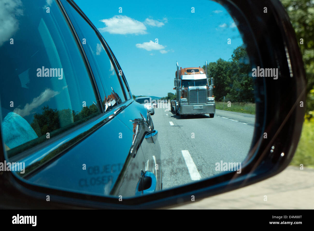 Semi truck in mirror Stock Photo - Alamy