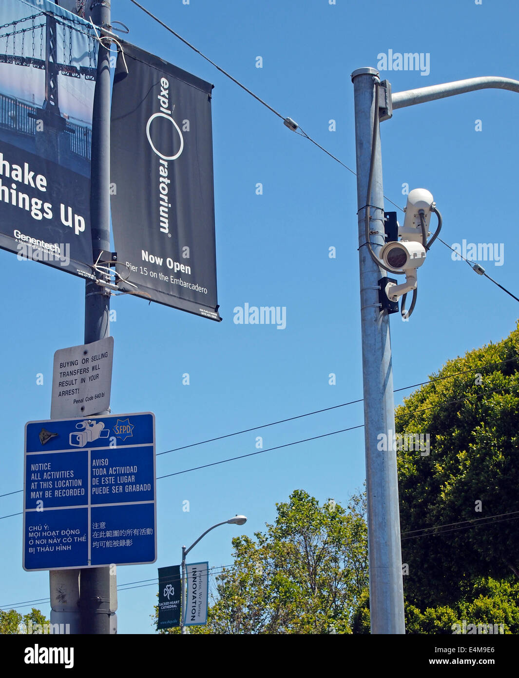 surveillance cameras multilingual warning sign San Francisco Stock