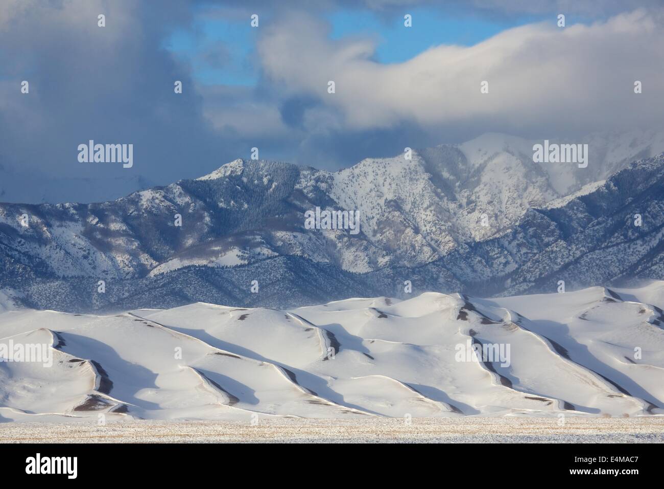 Great Sand Dunes National Park covered in snow in Winter. Stock Photo