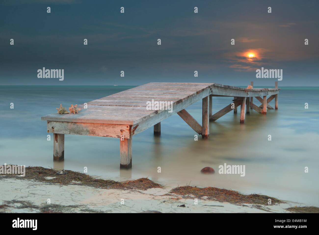 Full moon rising in Ambergris Caye, Belize Stock Photo