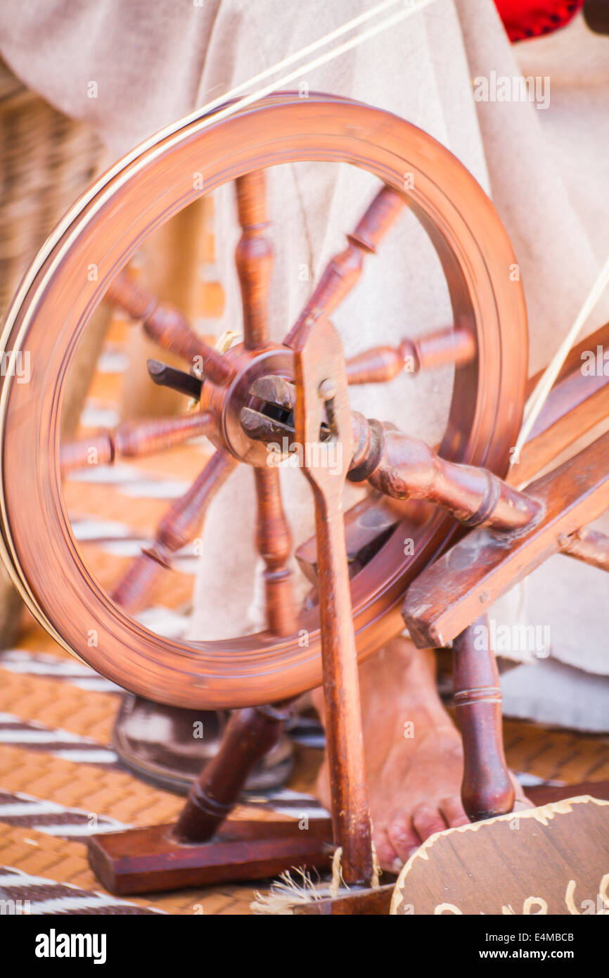 distaff, woman spinning yarn on an old spinning wheel Stock Photo Alamy