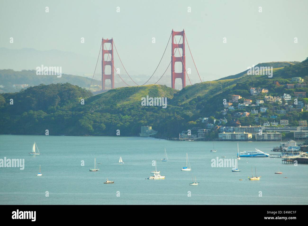 Golden Gate Bridge in springtime with San Francisco Bay and sailboats and Sausalito from Tiburon, California Stock Photo