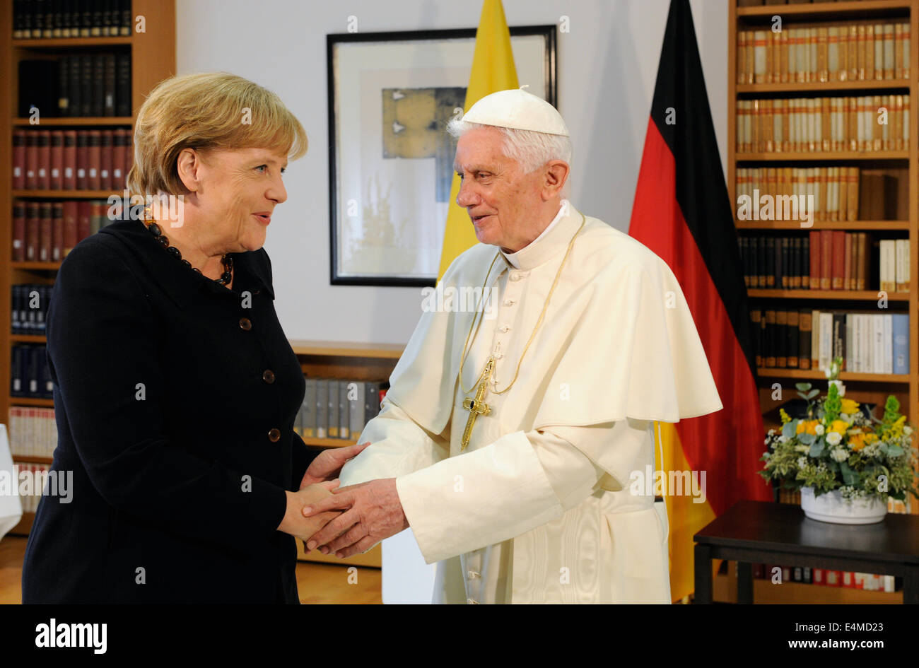 FILE - An archive picture dated shows Pope Benedict XVI greeting German Chancellor Angela Merkel inthe office of the German Conference of Bishops in Berlin, Germany. Merkel turns 60 on 17 July 2014. Photo: Soeren Stache/dpa Stock Photo