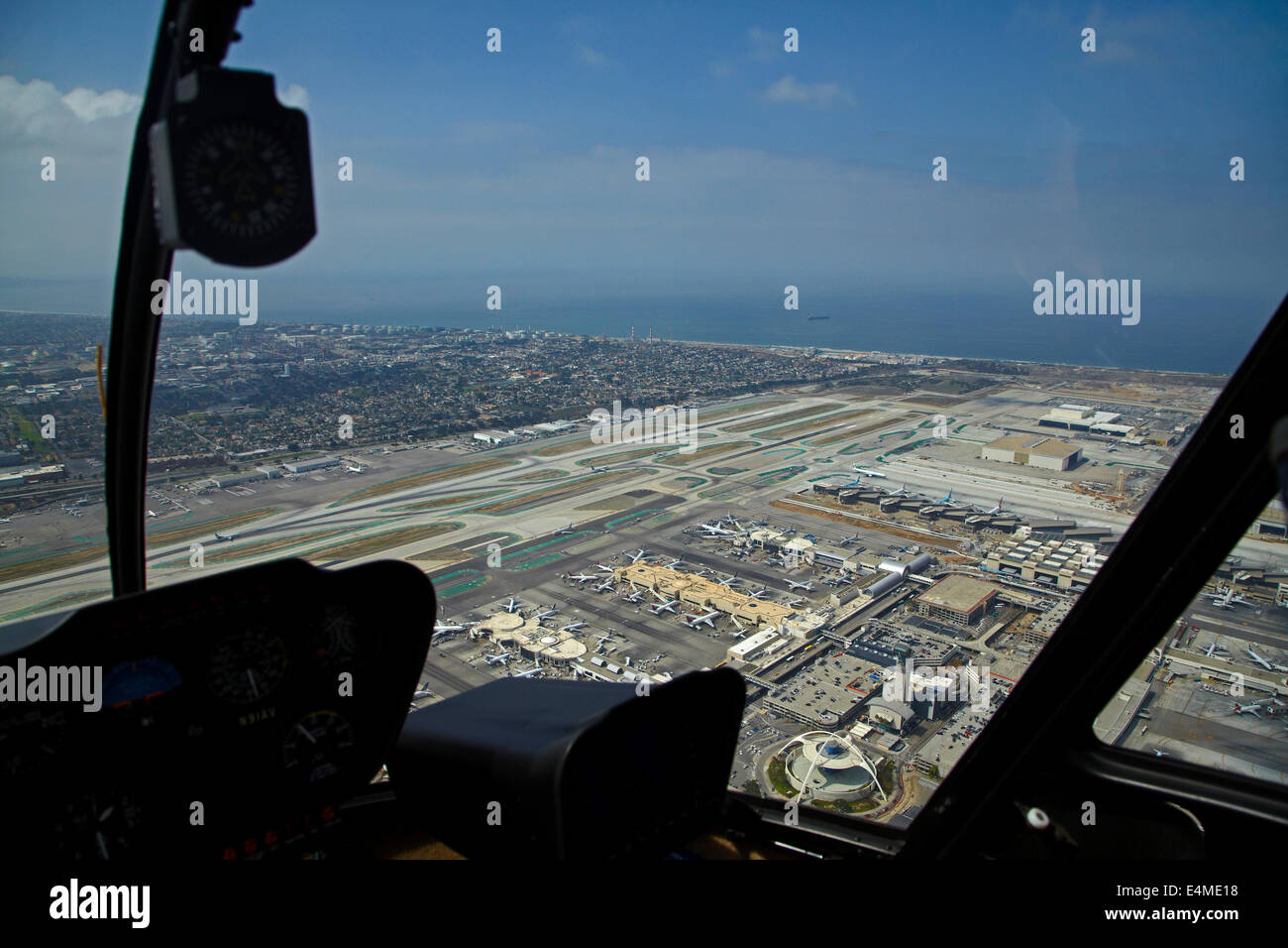 Helicopter over Los Angeles International Airport (LAX), Los Angeles, California, USA - aerial Stock Photo