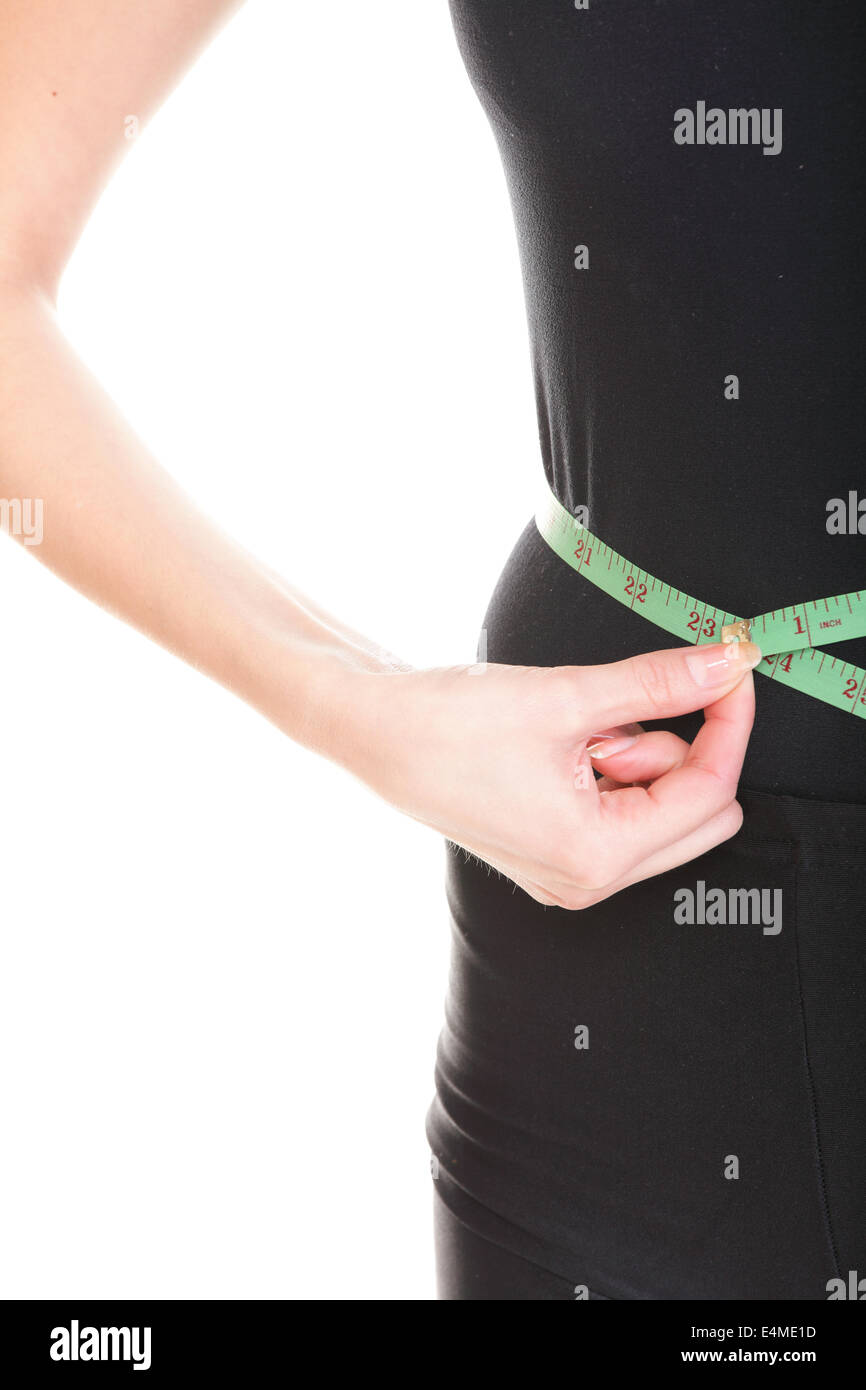 Pretty woman shows her weight loss wearing measure tapes isolated on white  Stock Photo - Alamy
