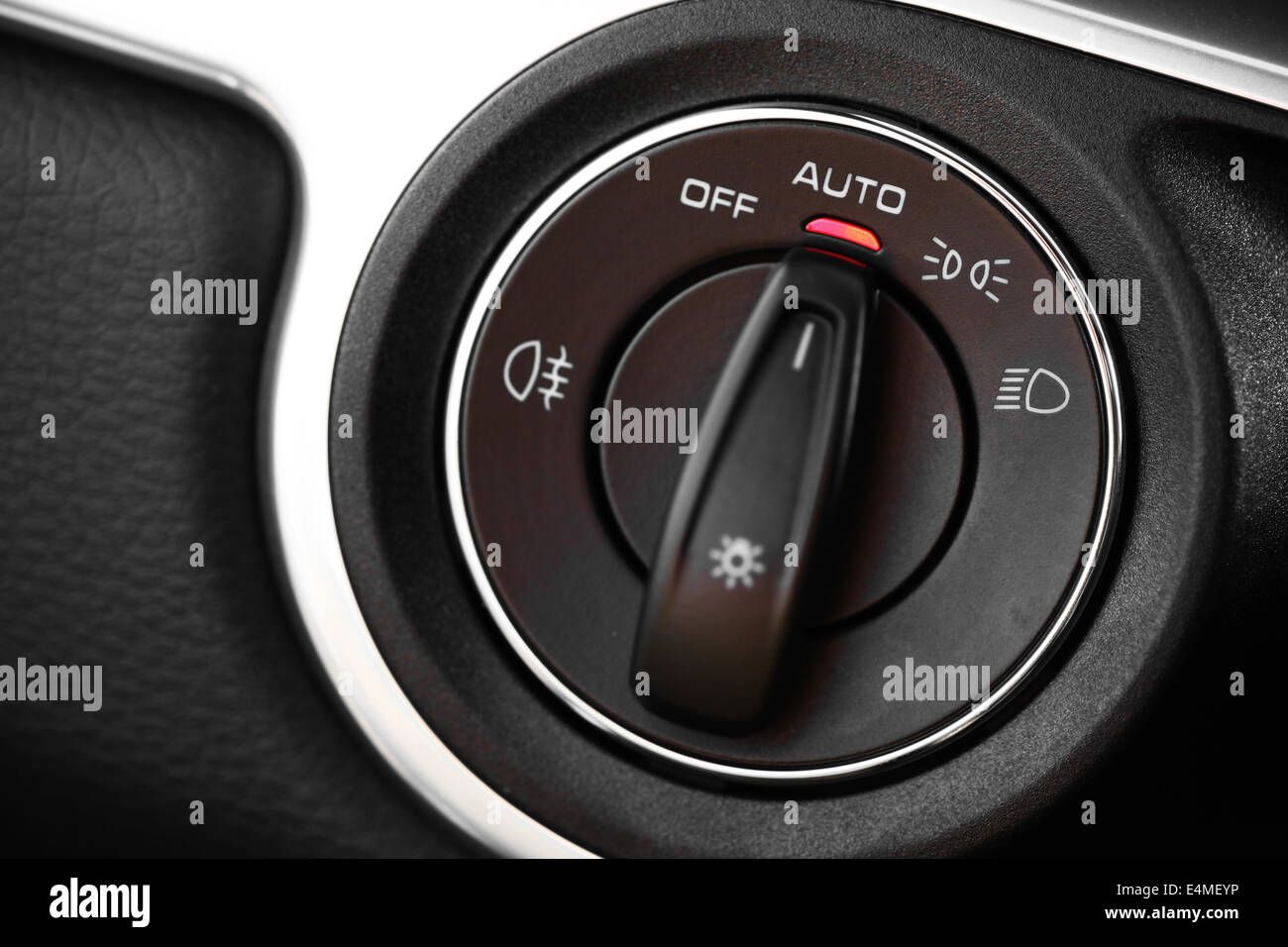Detail of the headlight button in a car Stock Photo Alamy