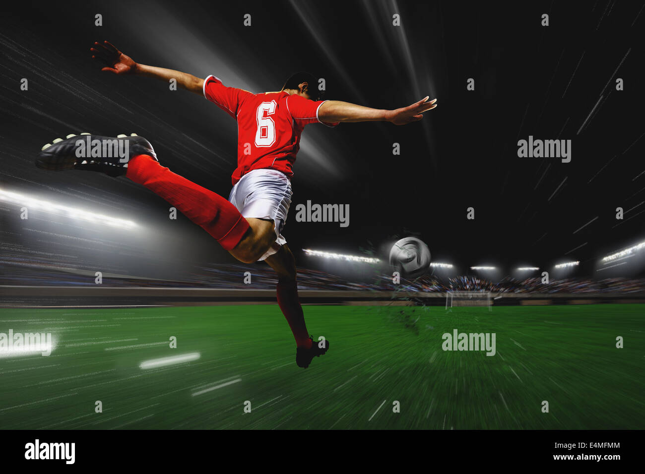 Soccer Player Kicking The Ball Stock Photo Alamy