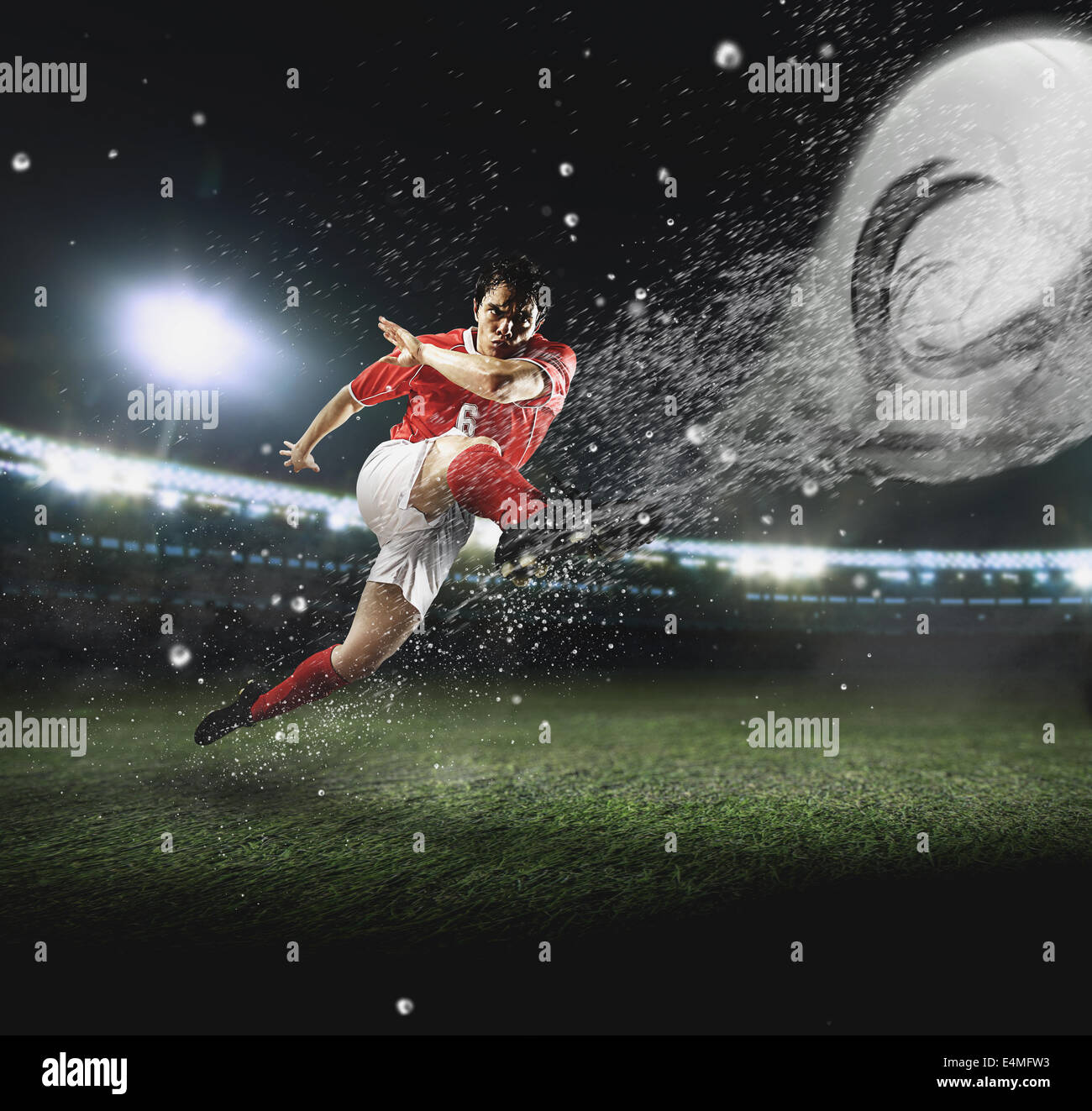 Soccer Player Kicking The Ball Stock Photo Alamy
