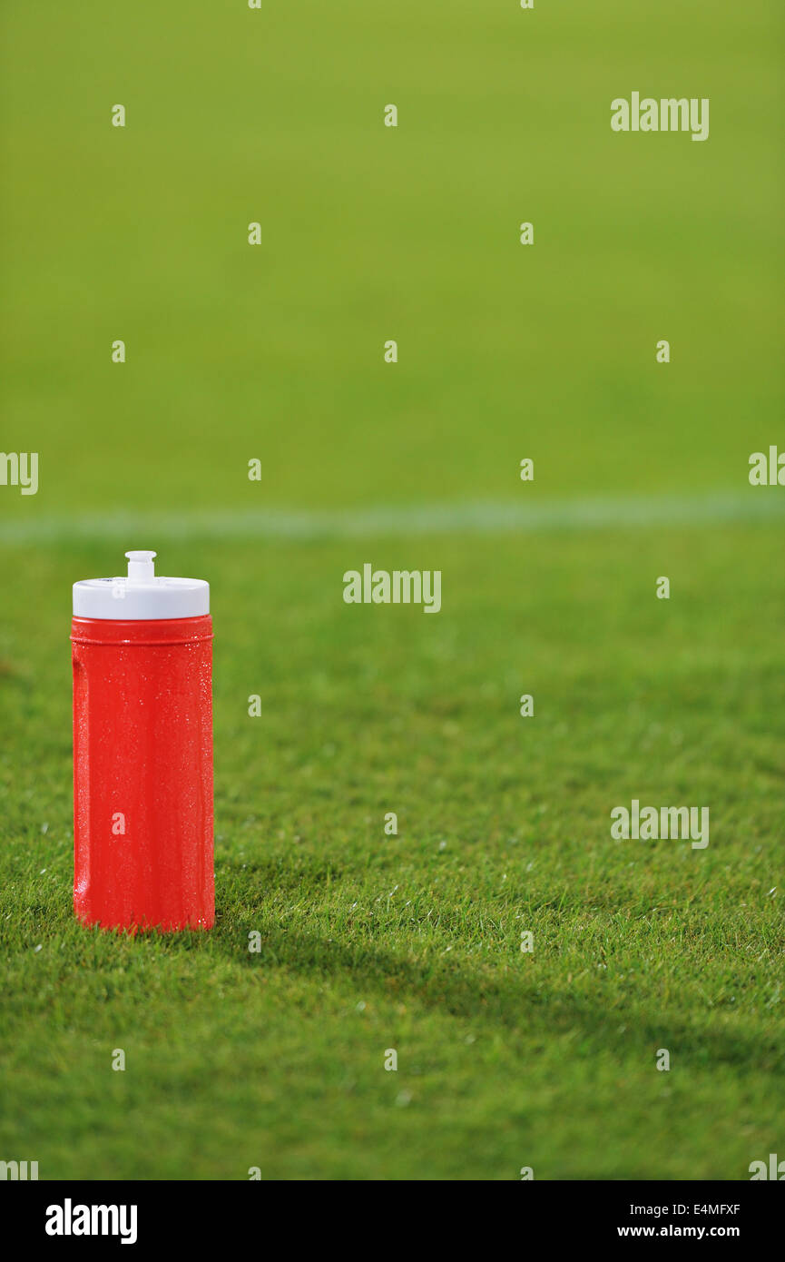 Drink bottle on soccer field Stock Photo Alamy