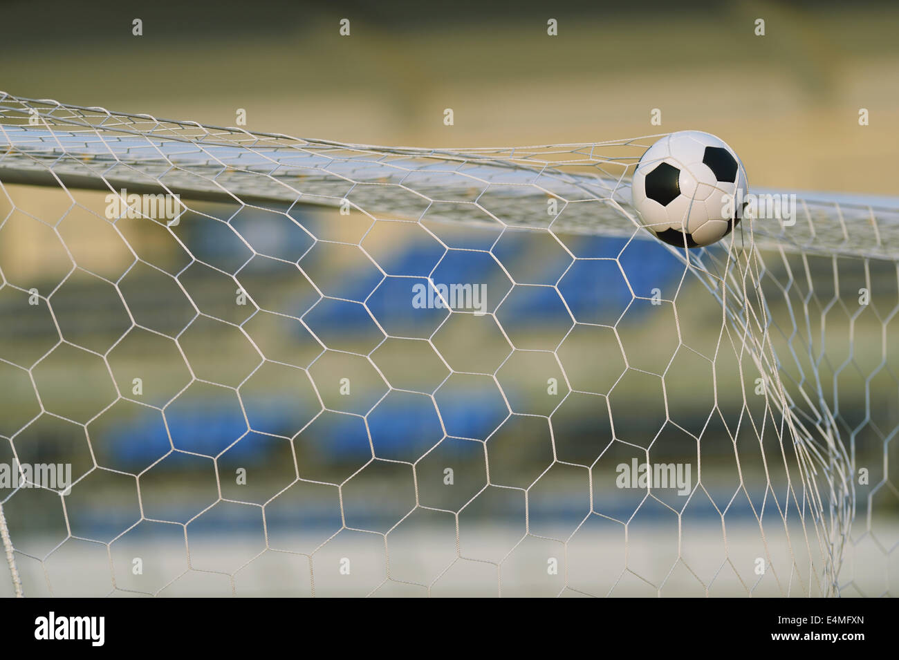 Soccer ball in the net Stock Photo Alamy