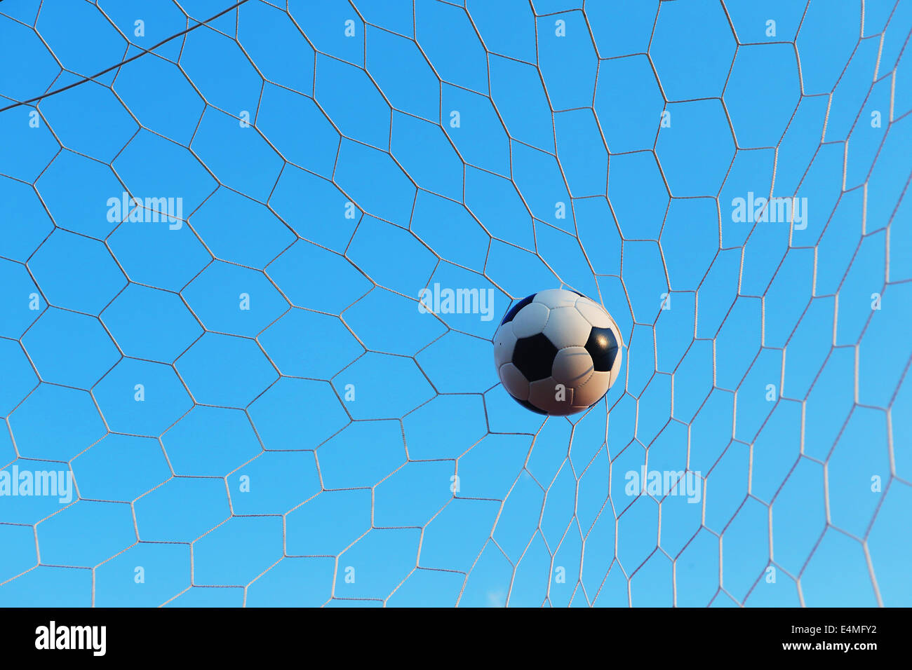 Soccer ball in the net Stock Photo Alamy
