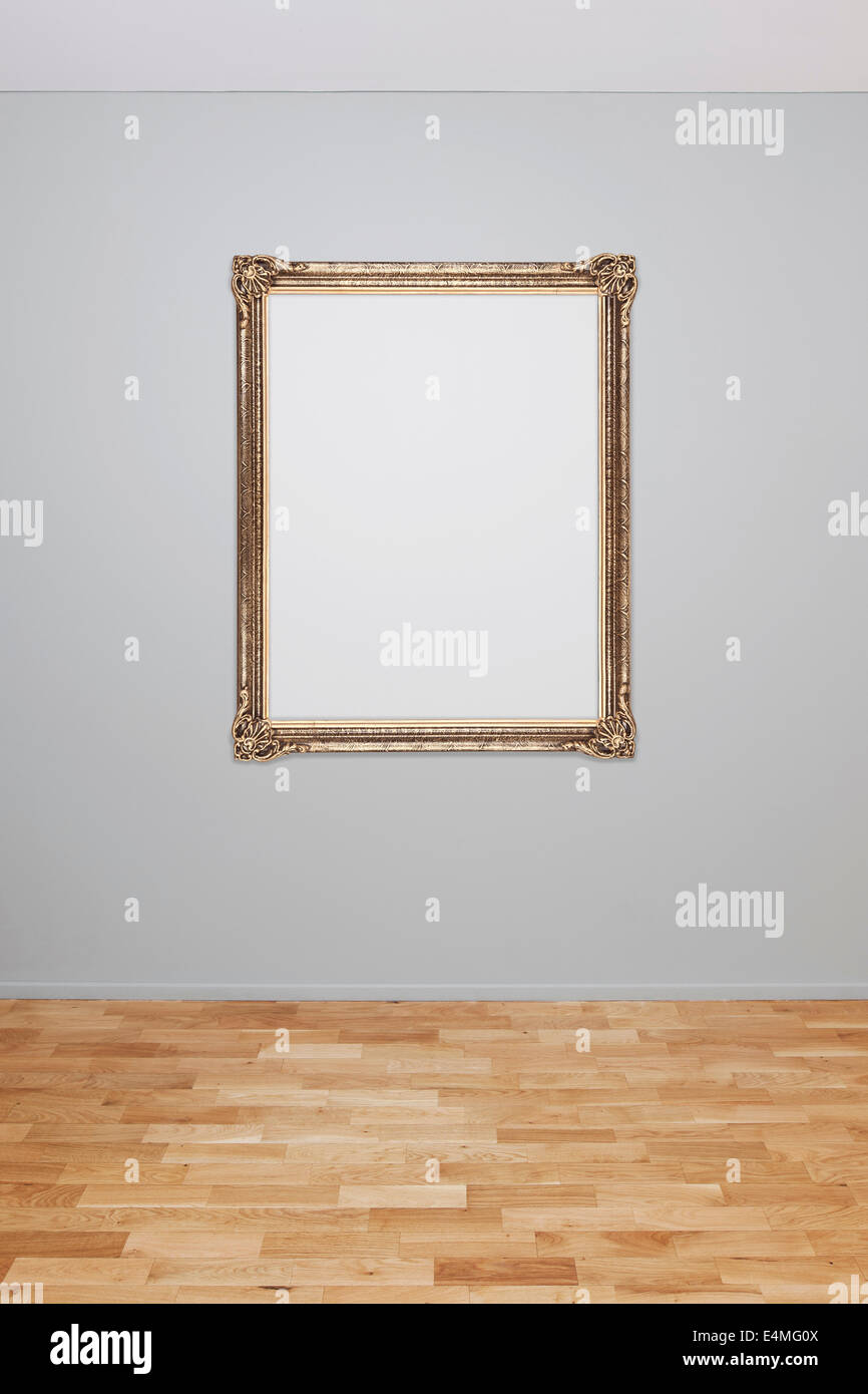 Blank wall interior with an empty frame Stock Photo