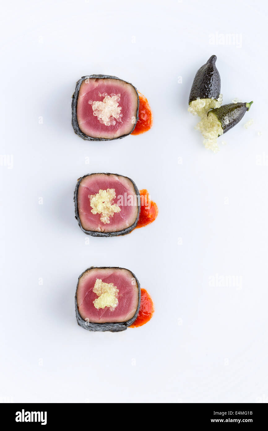 Nori wrapped tuna topped with caviar lime hors' d'oeuvres Stock Photo