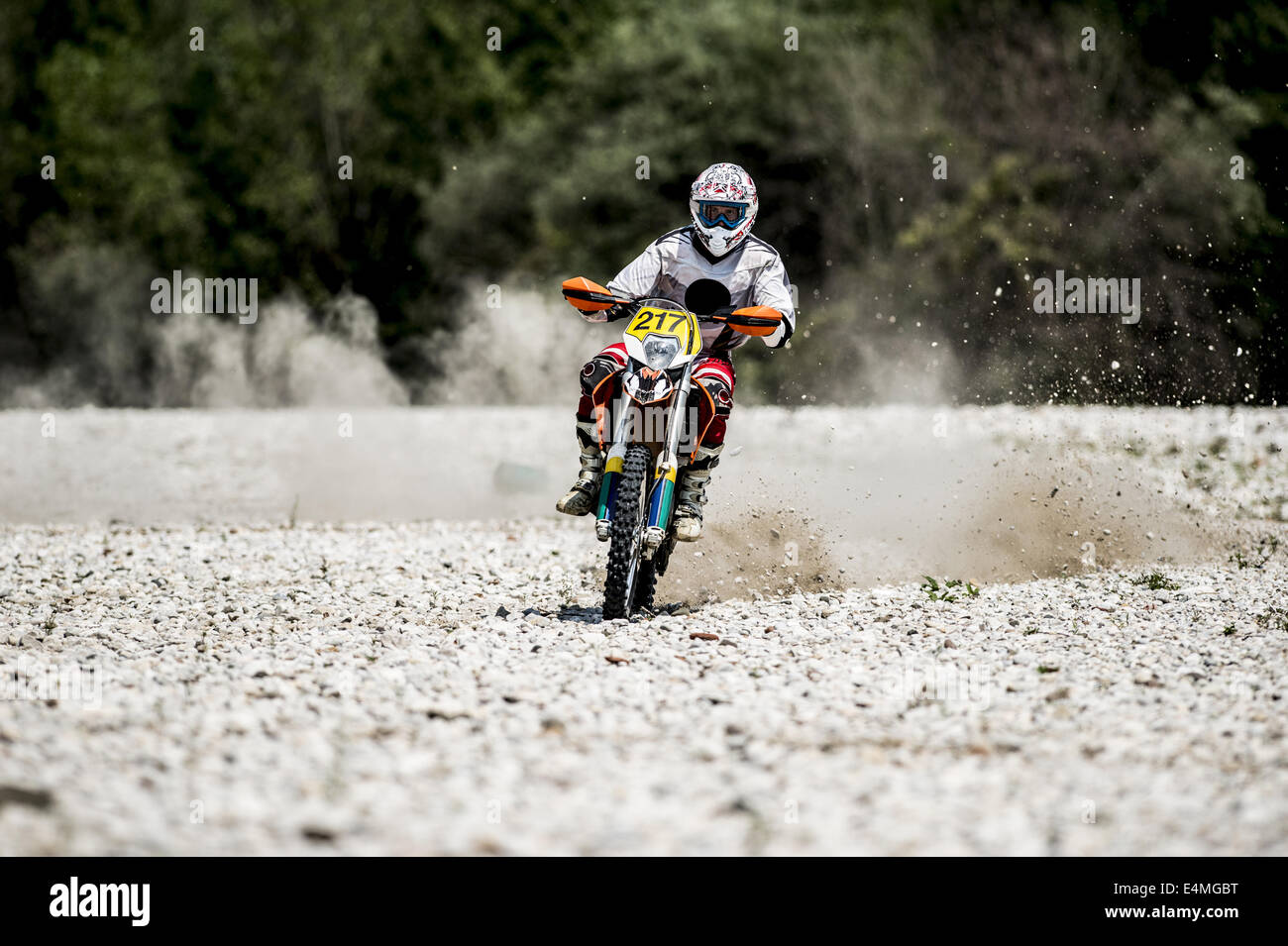 Man Riding Enduro Bike on Stony Trail Stock Photo - Alamy