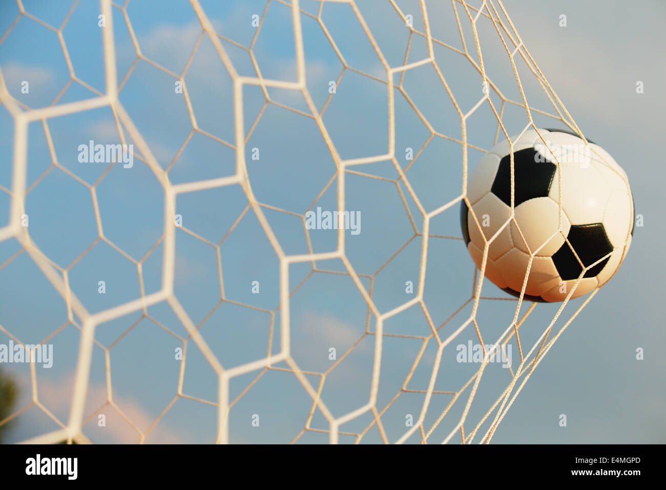Soccer ball in the net Stock Photo Alamy