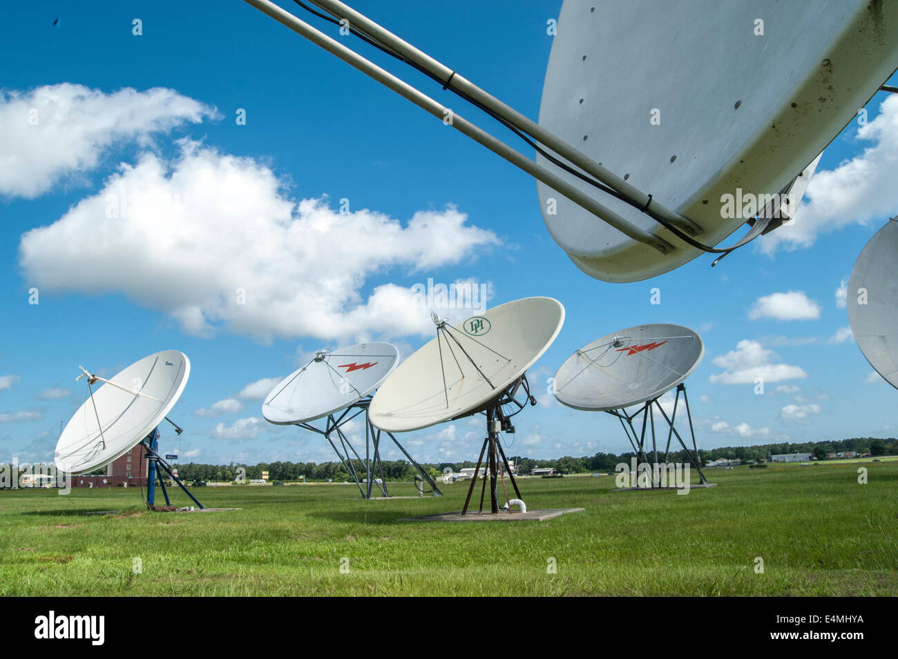 Array of satellite receiver dishes Stock Photo