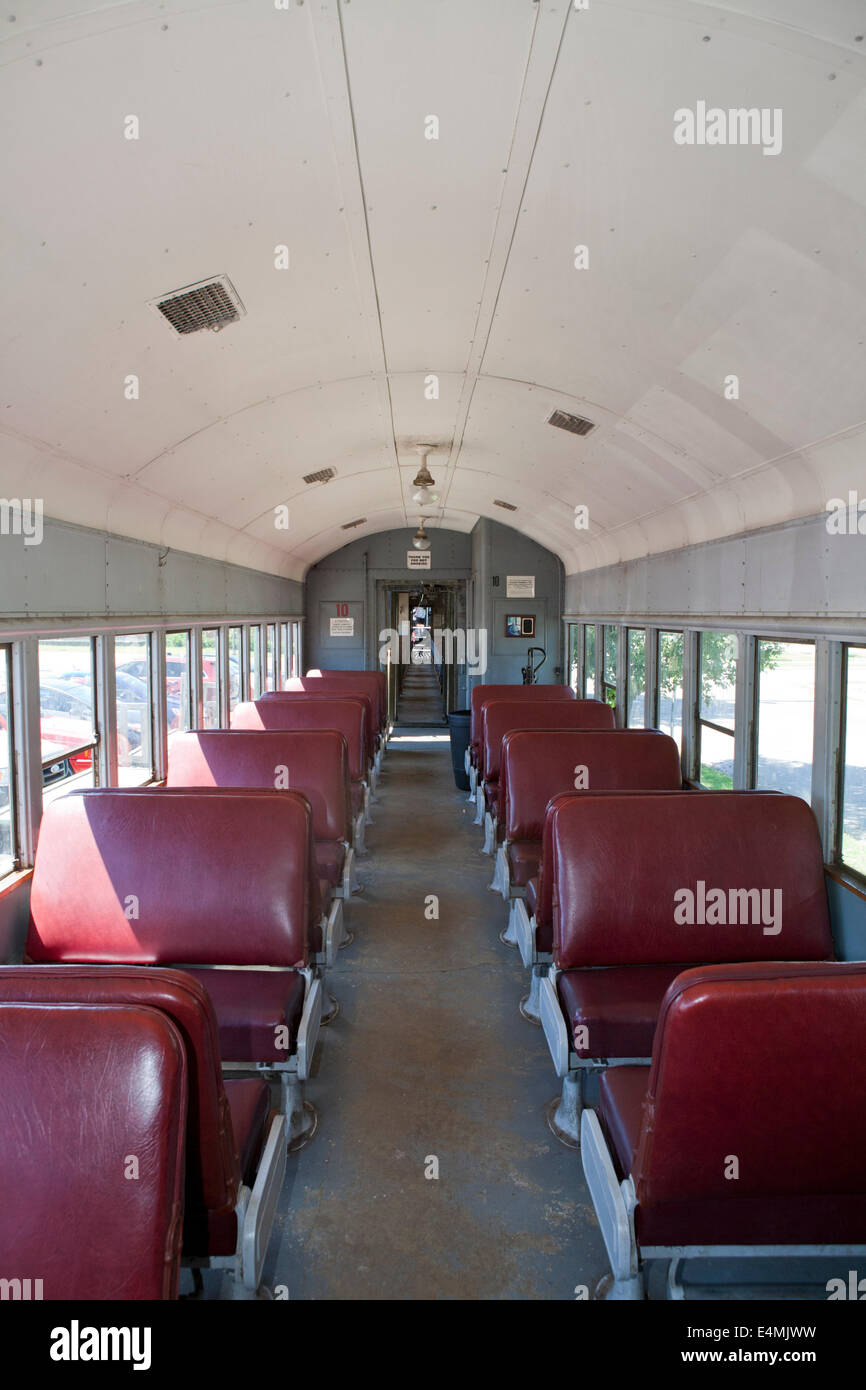 Empty, old passenger train and seats. Stock Photo