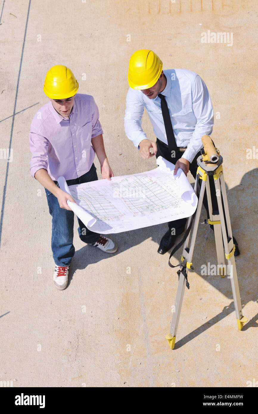 Team of architects on construciton site Stock Photo