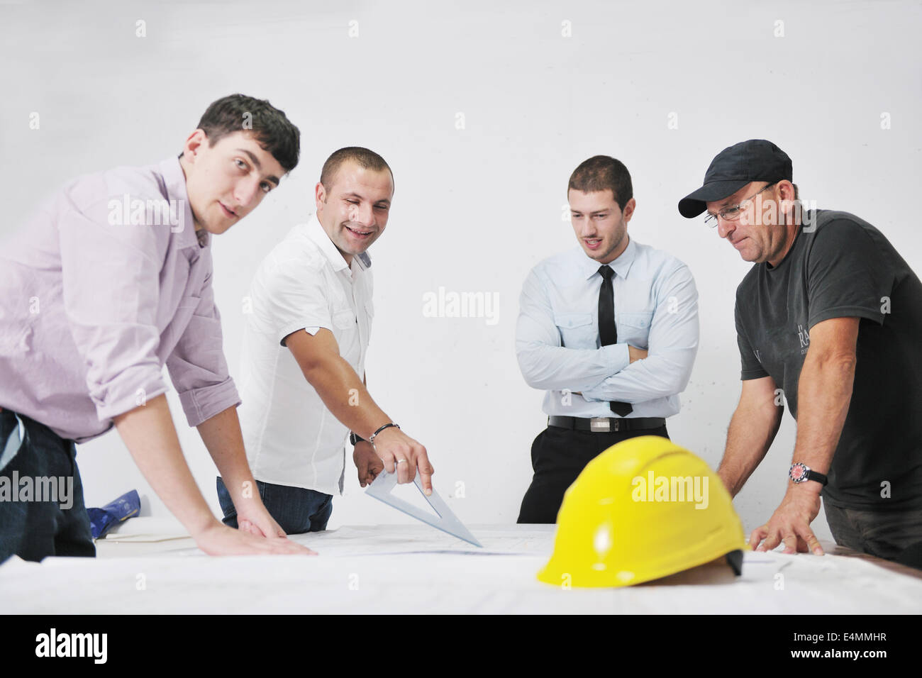 Team of architects on construciton site Stock Photo