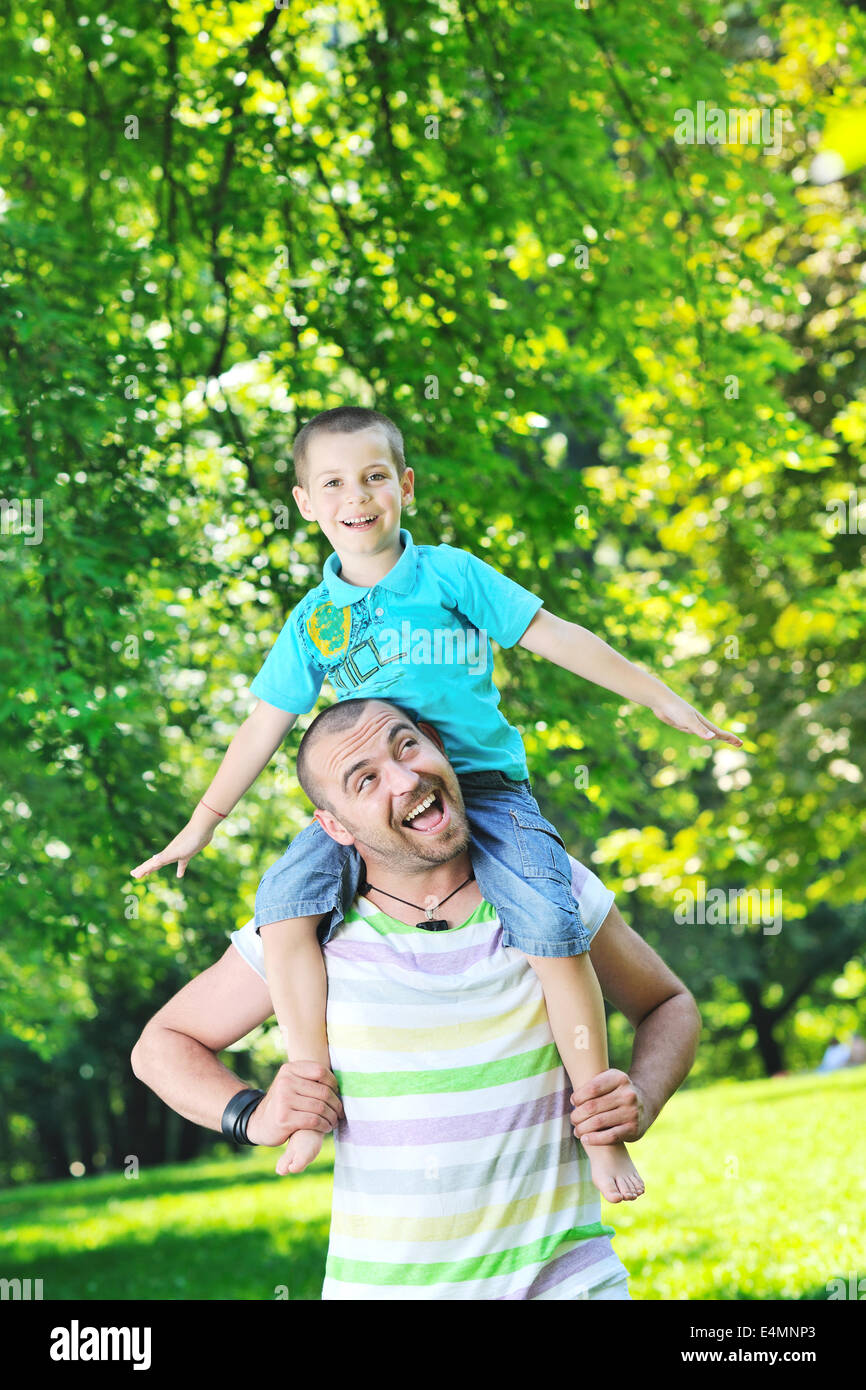 happy father and son have fun at park Stock Photo - Alamy
