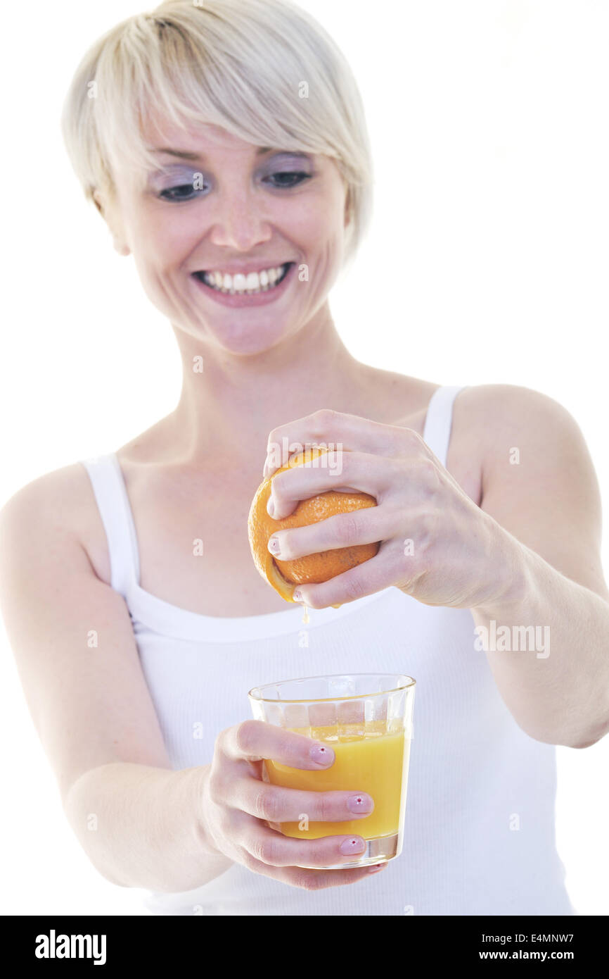 Young woman squeeze orange juice Stock Photo