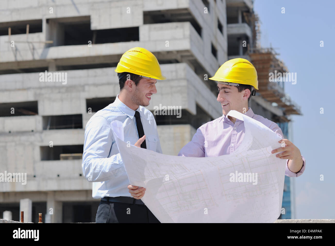 Team of architects on construciton site Stock Photo