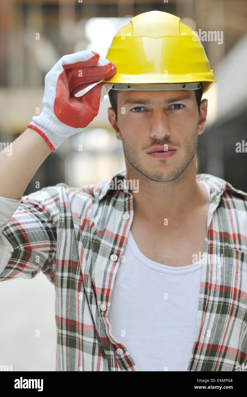 hard worker on construction site Stock Photo