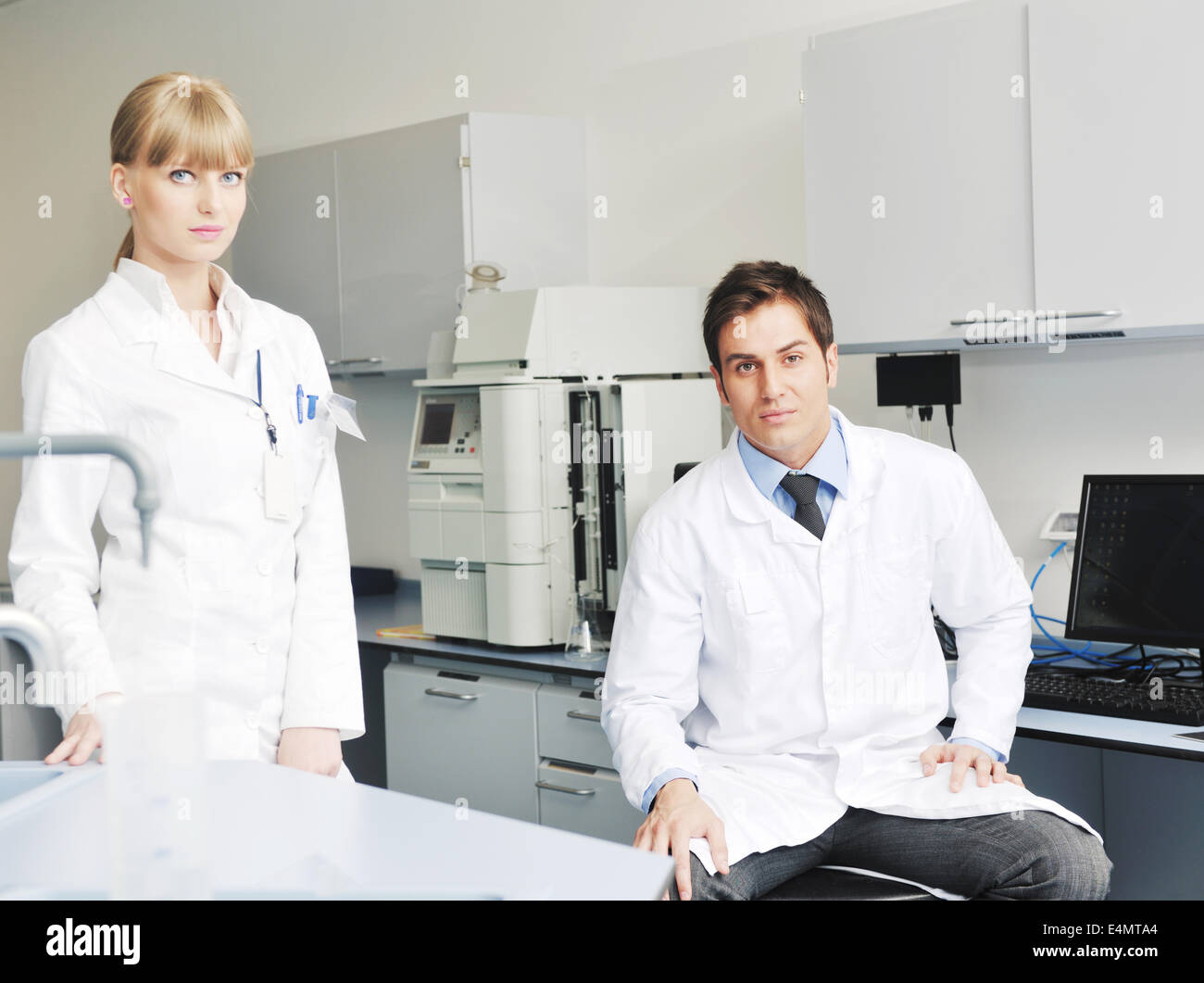 Science Help People science people in bright lab Stock Photo - Alamy
