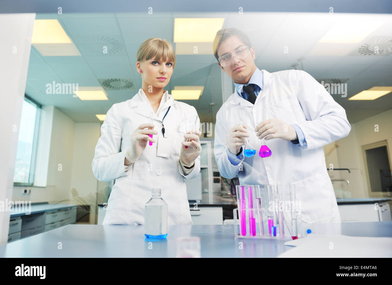 Science Help People science people in bright lab Stock Photo - Alamy